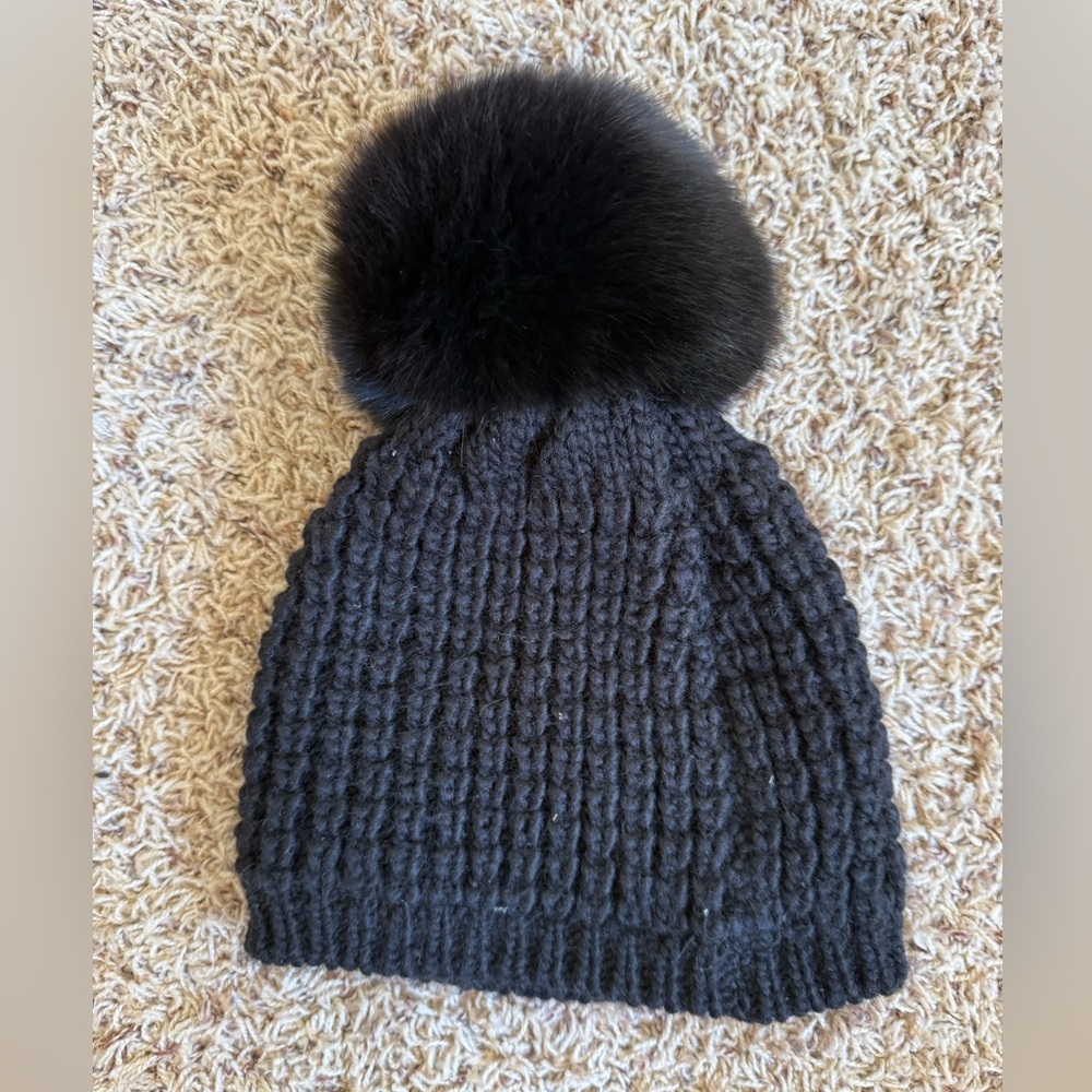 Knit hat with fox fur puff